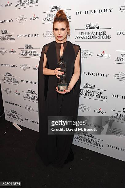 Billie Piper, winner of the Natasha Richardson Award for Best Actress, poses in front of the winners boards at The 62nd London Evening Standard...