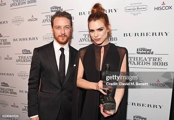 James McAvoy and Billie Piper, winner of the Natasha Richardson Award for Best Actress, pose in front of the winners boards at The 62nd London...