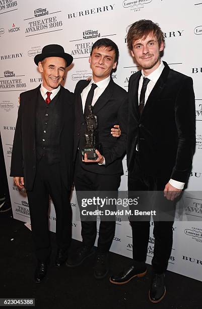 Presenter Mark Rylance poses with Joe Murphy and Joe Robertson, winners of the Editors Award for Good Chance Theatre, in front of the winners boards...