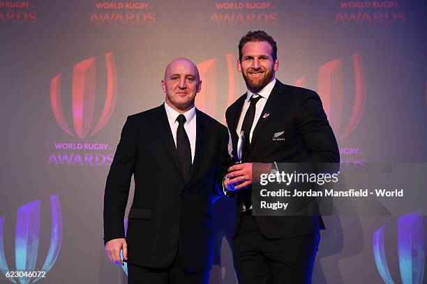 Kieran Read is presented with the World Rugby via Getty Images Team of the Year 2016 Award on behalf of the All Blacks by Keith Wood during the World...