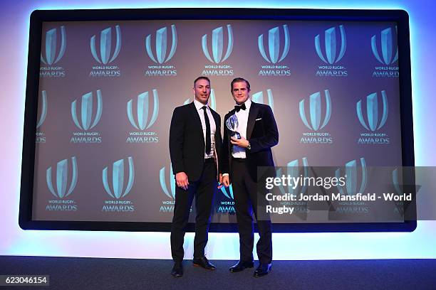 Jamie Heaslip is presented with the IRPA Try of the Year 2016 Award by Stephen Ferris during the World Rugby via Getty Images Awards 2016 at the...