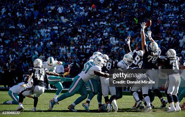 Andrew Franks of the Miami Dolphins kicks a field goal against the San Diego Chargers during the first half of a game at Qualcomm Stadium on November...