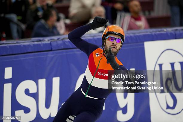 Sjinkie Knegt of the Netherlands celebrates a new world record after winning the Men's 1500 meter Final during the ISU World Cup Short Track Speed...