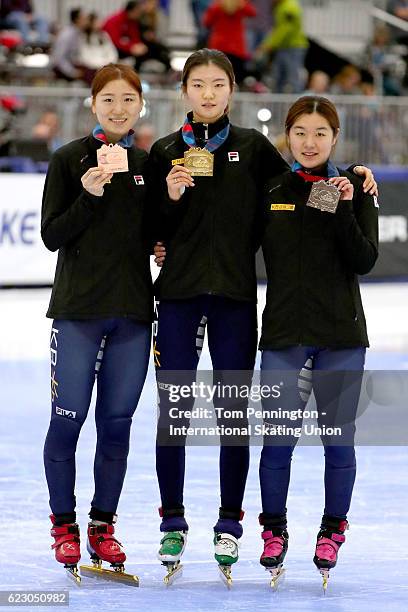 Do Hee Noh of Korea with the bronze, Suk Hee Shim of Korea with the gold and Jiyoo Kim of Korea with the silver celebrate after the Ladies 1000 meter...