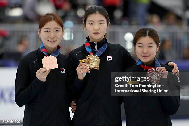 Do Hee Noh of Korea with the bronze, Suk Hee Shim of Korea with the gold and Jiyoo Kim of Korea with the silver celebrate after the Ladies 1000 meter...