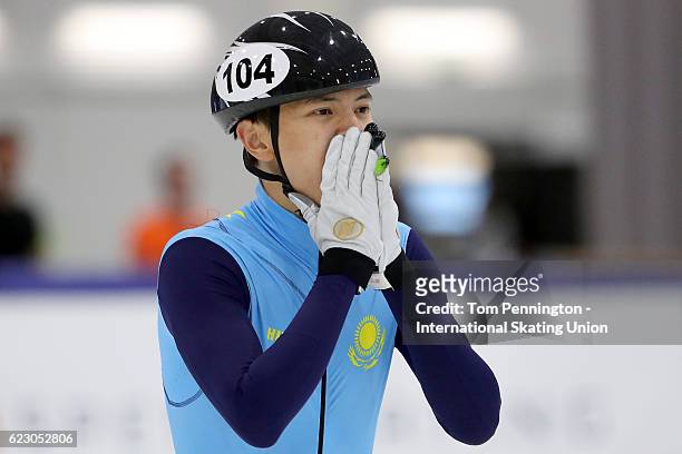 Abzal Azhgaliyev of Kazakhstan reacts to beating Tianyu Han of China in the Men's 500 meter Final during the ISU World Cup Short Track Speed Skating...
