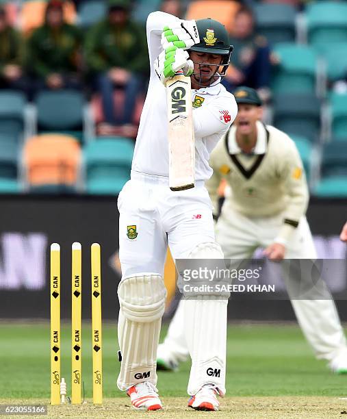 South Africa's batsman Quinton de Kock is clean bowled off Australia's paceman Josh Hazlewood on the third day's play of the second Test cricket...