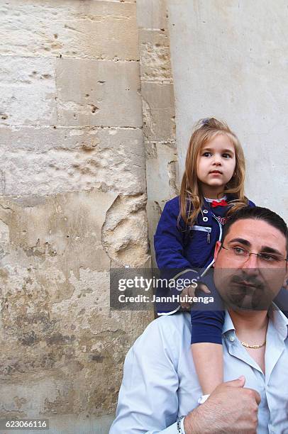 ragusa ibla, sicily: father and daughter at celebration of saint - offspring culture tourism festival stock pictures, royalty-free photos & images