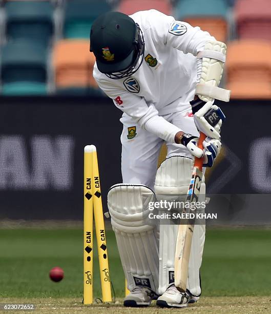 SouthAfrica's batsman Keshav Maharaj is clean bowled off Australia's paceman Josh Hazlewood on the third day's play of the second Test cricket match...