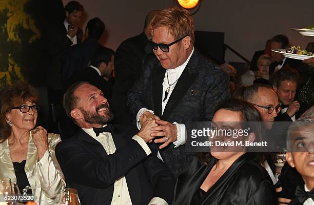 Nanette Newman, Ralph Fiennes, Sir Elton John and Lindsay Brunnock attend the 62nd London Evening Standard Theatre Awards, recognising excellence...