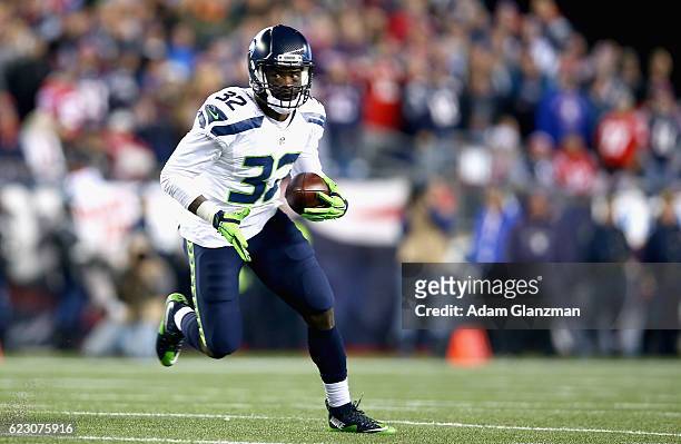 Christine Michael of the Seattle Seahawks carries the ball during the second quarter of a game against the New England Patriots at Gillette Stadium...