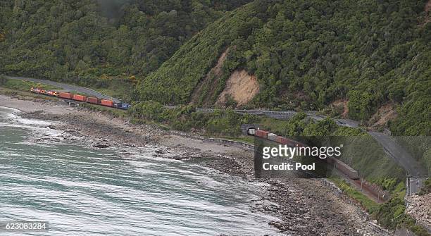 Freight train sitting where it came to a halt beside Highway One north of Kaikoura is seen on November 14, 2016 in New Zealand. The 7.5 magnitude...