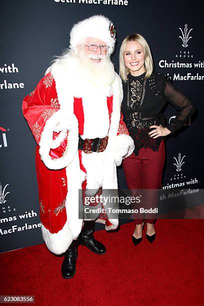 Kristen Bell poses with Santa Claus at The Grove Christmas With Seth MacFarlane at The Grove on November 13, 2016 in Los Angeles, California.