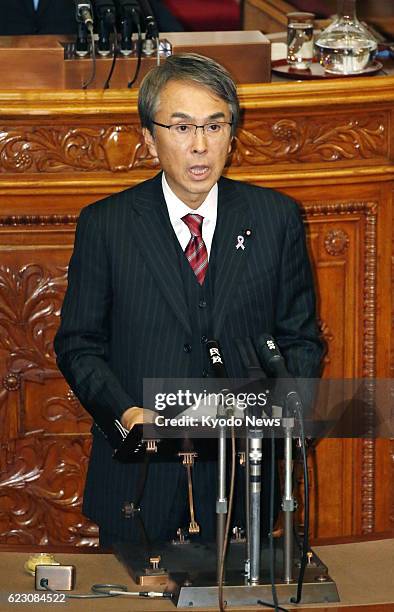 Economic and Fiscal Policy Minister Nobuteru Ishihara explains about the Trans-Pacific Partnership trade agreement and TPP-related bills at the upper...