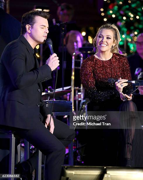 Seth MacFarlane and Rachel Platten perform a duet onstage during The Grove Christmas event held on November 13, 2016 in Los Angeles, California.