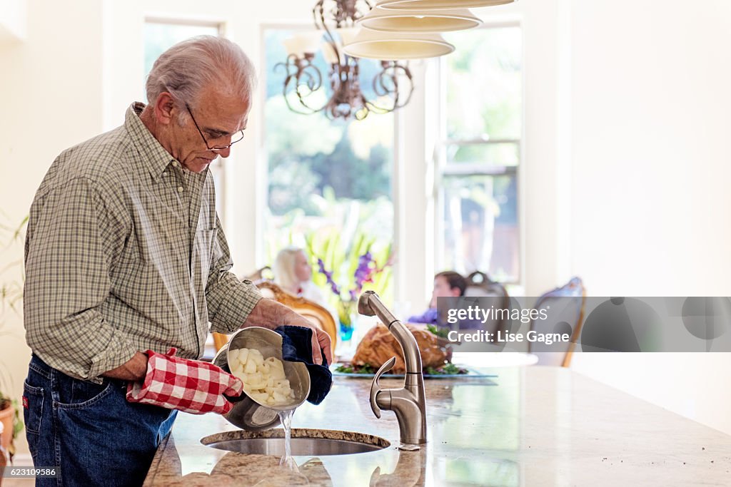 Grandfather preparing thanx giving dinner