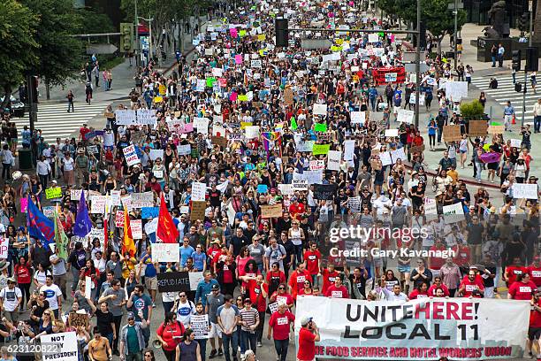 trump protest march, figueroa street downtown los angeles - trade union stock pictures, royalty-free photos & images