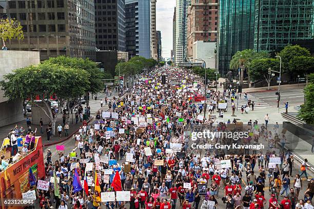 trump protest march, figueroa street downtown los angeles - protests against the policies of donald trump and us administration stockfoto's en -beelden