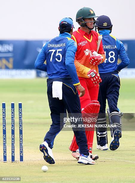 Zimbabwe batsman Sean Williams walks after loosing his wicket during the opening match of an ODI series Sri Lanka vs Zimbabwe in Harare, on November...