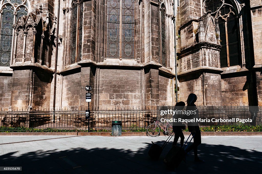 Women passing by Cathedrale Saint-Andre...