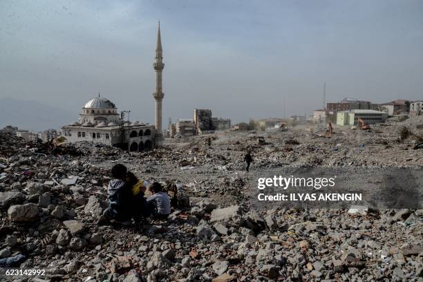Damaged buildings are seen on November 14, 2016 in Sirnak after a 246-day curfew was partially lifted. - The curfew in Sirnak, a city of 290 was...