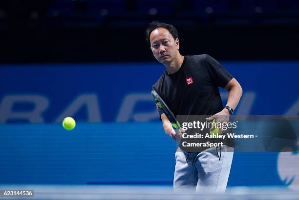Michael Chang, coach of Kei Nishikori during the warm up before the match against Stan Wawrinka of Switzerland in their Group John McEnroe match...