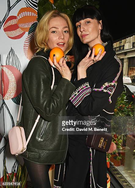 Clara Paget and Erin O'Connor take part in the Cointreau project at Liberty London on November 14, 2016 in London, England.