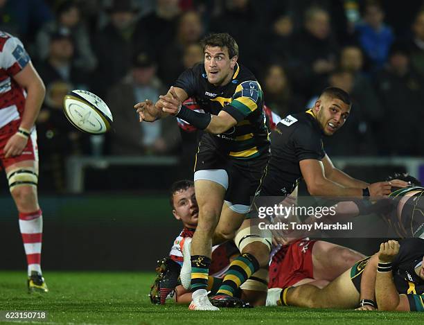 Lee Dickson of Northampton Saints passes the ball during the Anglo-Welsh Cup match between Northampton Saints and Gloucester Rugby at Franklin's...