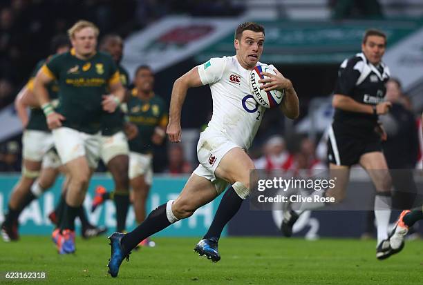 George Ford of England breaks away to score his team's third try during the Old Mutual Wealth Series match between England and South Africa at...