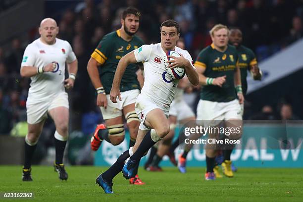 George Ford of England breaks away to score his team's third try during the Old Mutual Wealth Series match between England and South Africa at...