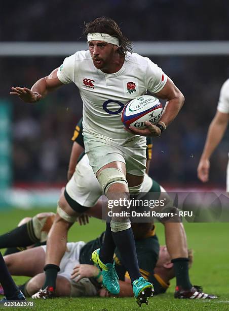 Tom Wood of England runs with the ball during the Old Mutual Wealth Series match between England and South Africa at Twickenham Stadium on November...