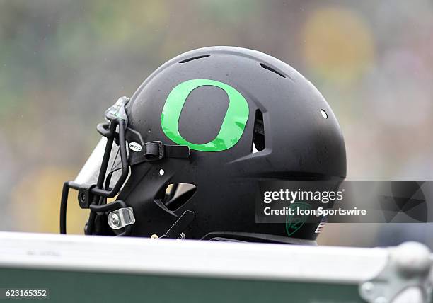 An Oregon Ducks helmet sits on an equipment box during a PAC-12 NCAA football game between the Oregon Ducks and the Stanford Cardinal on November 12...