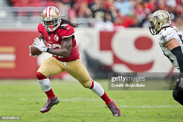 Running back DuJuan Harris of the San Francisco 49ers takes off with a catch against the New Orleans Saints for an 11-yard gain in the second quarter...