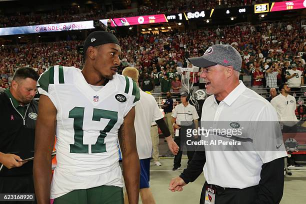 Assistant Special Teams Coach Jeff Hammerschmidt of the New York Jets speaks with Wide Receiver Charone Peake during the game against the Arizona...