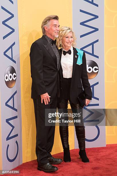 John Easterling and singer-songwriter Olivia Newton-John attend the 50th annual CMA Awards at the Bridgestone Arena on November 2, 2016 in Nashville,...