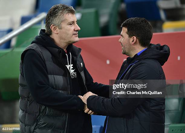 Former Croatian striker Davor Suker meets former Northern Ireland striker David Healy as the Croatia squad take part in a training session at Windsor...