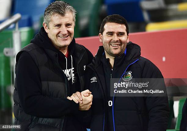 Former Croatian striker Davor Suker meets former Northern Ireland striker David Healy as the Croatia squad take part in a training session at Windsor...