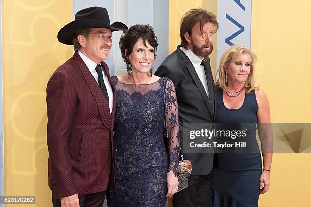 Kix Brooks, Barbara Brooks, Ronnie Dunn and Janine Dunn attend the 50th annual CMA Awards at the Bridgestone Arena on November 2, 2016 in Nashville,...