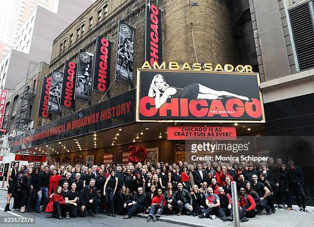 Original, former and current "Chicago" cast members pose for a photo as they celebrate the 20th anniversary of "Chicago" opening on Broadway at the...