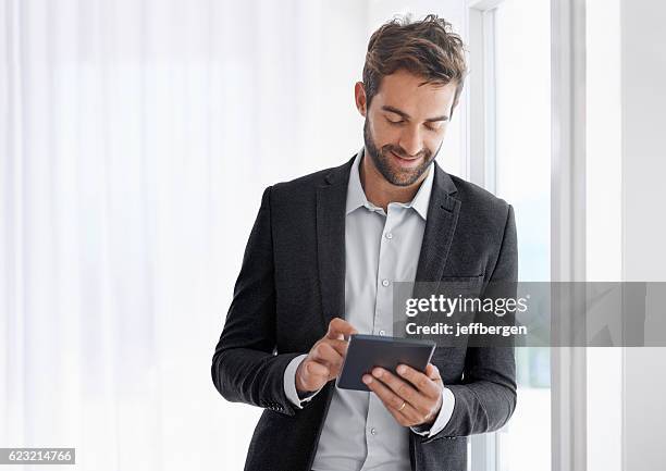various business tasks performed through one platform - suit jacket stock pictures, royalty-free photos & images