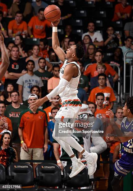 University of Miami guard Bruce Brown shoots during an NCAA basketball game between the Western Carolina University Catamounts and the University of...