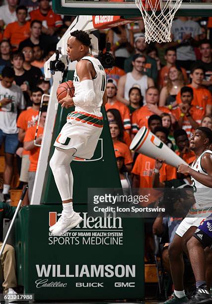 University of Miami guard Bruce Brown grabs a rebound during an NCAA basketball game between the Western Carolina University Catamounts and the...