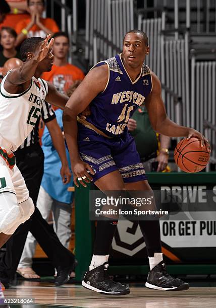 Western Carolina forward Charlendez Brooks dribbles during an NCAA basketball game between the Western Carolina University Catamounts and the...