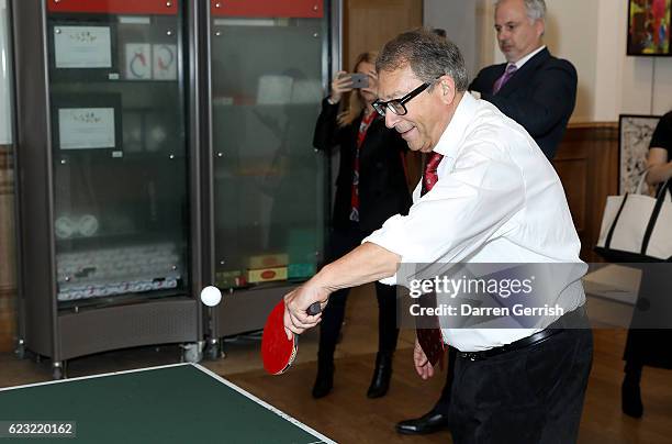 Stuart Weitzman plays pingpong during a private dinner to celebrate the opening of the Stuart Weitzman London Flagship Store, at the Royal Academy of...