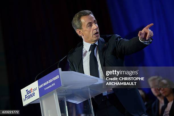 Nicolas Sarkozy, former French president and candidate for the right-wing Les Republicains primaries ahead of the 2017 presidential election, speaks...