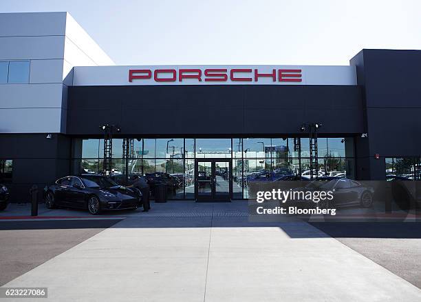 Porsche AG vehicles sit outside the Porsche Experience Center in Carson, California, U.S., on Monday, Nov. 14, 2016. Porsche Cars North America Inc....