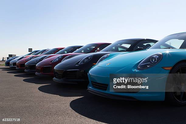 Porsche AG vehicles sit on a track at the Porsche Experience Center in Carson, California, U.S., on Monday, Nov. 14, 2016. Porsche Cars North America...