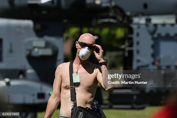 Tourists trapped by the Kaikoura earthquakes arrive by military helicopters at Woodend School grounds on November 15, 2016 in Christchurch, New...