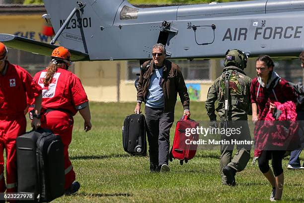 Tourists trapped by the Kaikoura earthquakes arrive by military helicopters at Woodend School grounds on November 15, 2016 in Christchurch, New...