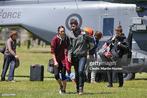 Tourists trapped by the Kaikoura earthquakes arrive by military helicopters at Woodend School grounds on November 15, 2016 in Christchurch, New...